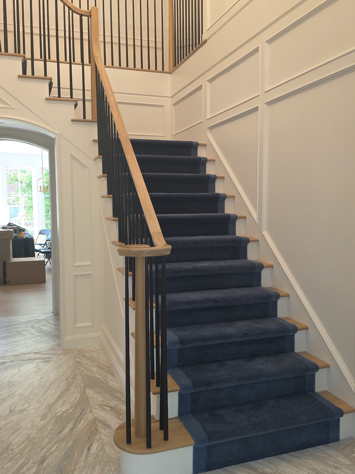 Navy bordered stair runner in a modern Malverne home