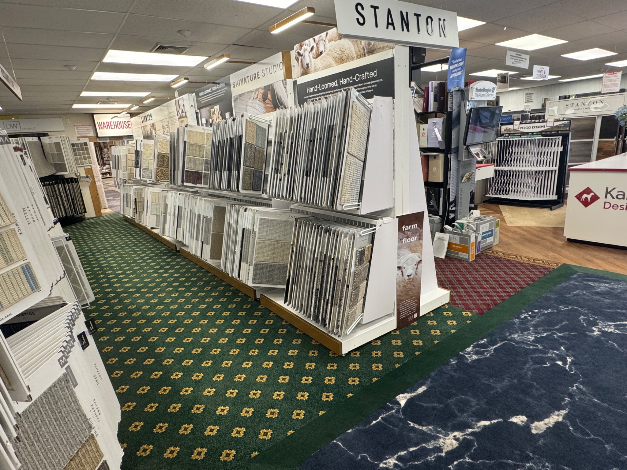 Stanton carpet and custom rug displays in the Lynbrook showroom